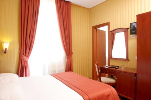 Habitación Doble Pequeña del hotel Augusta Lucilla Palace. Foto 1