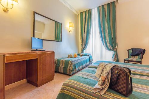 Habitación Triple del hotel Raeli Siracusa. Foto 2