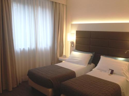 Habitación Doble Estándar - 2 camas del hotel Mercure Bergamo Aeroporto. Foto 2