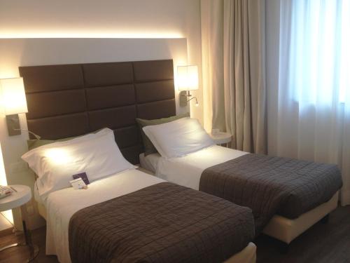 Habitación Doble Estándar - 2 camas del hotel Mercure Bergamo Aeroporto. Foto 3