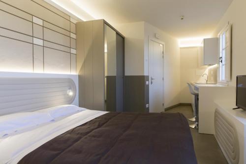 Suite Deluxe del hotel PALAZZO DEI CIOMPI. Foto 3