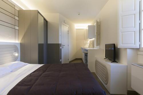 Suite Deluxe del hotel PALAZZO DEI CIOMPI. Foto 4