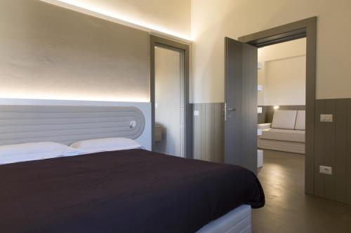 Suite Con Cocina 1 Cama king 1 habitación Vista ciudad Sofá Cama incluido Normal del hotel PALAZZO DEI CIOMPI. Foto 13
