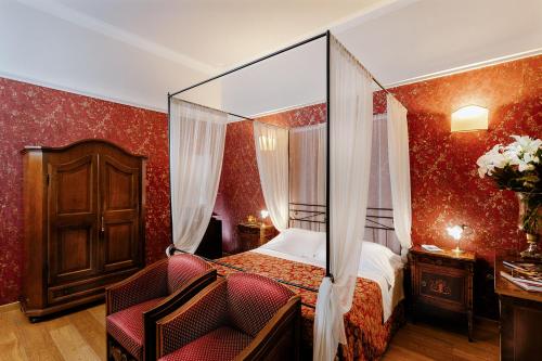 Habitación Triple del hotel Palazzo Dal Borgo