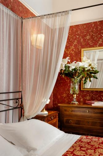 Habitación Triple del hotel Palazzo Dal Borgo. Foto 1