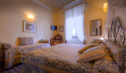 Habitación Triple del hotel Palazzo Dal Borgo. Foto 4