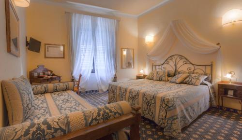 Habitación Triple del hotel Palazzo Dal Borgo. Foto 6