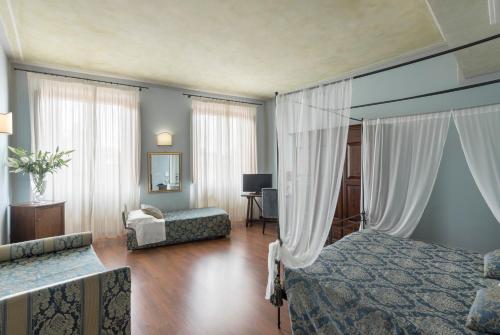 Habitación cuádruple del hotel Palazzo Dal Borgo