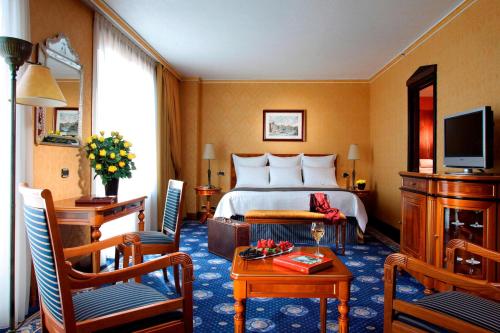 Suite Junior Executive con acceso al salón del hotel Rome Marriott Park. Foto 1
