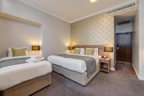 Habitación Familiar del hotel Best Western Mornington Hyde Park. Foto 1