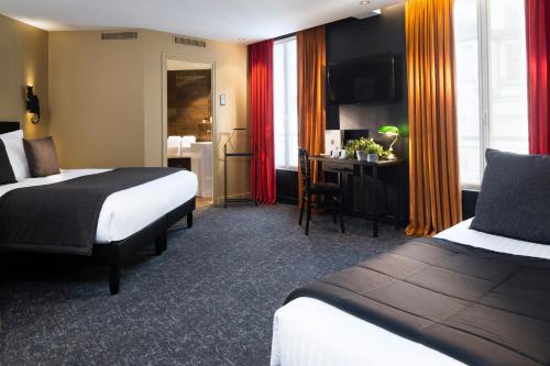 Habitación Triple Deluxe del hotel Le Chat Noir