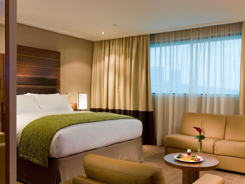 Habitación familiar, 2 camas dobles del hotel Sofitel London Heathrow. Foto 2
