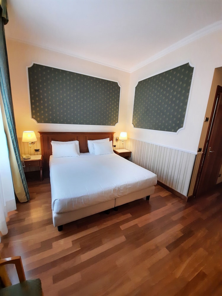Habitación Triple del hotel Andreola Central. Foto 6