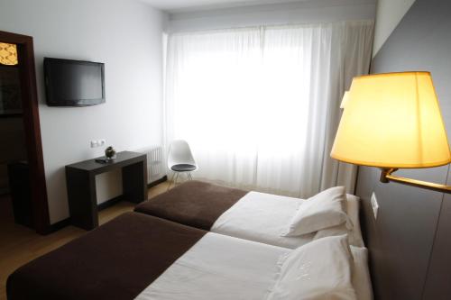 Habitación Doble - 1 o 2 camas del hotel Méndez Núñez. Foto 1