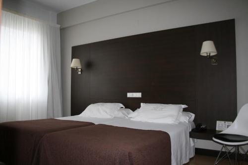 Habitación Doble - 1 o 2 camas del hotel Méndez Núñez. Foto 10
