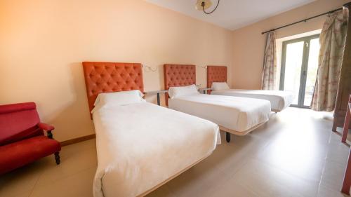 Habitación Triple del hotel Villa Marcilla. Foto 3