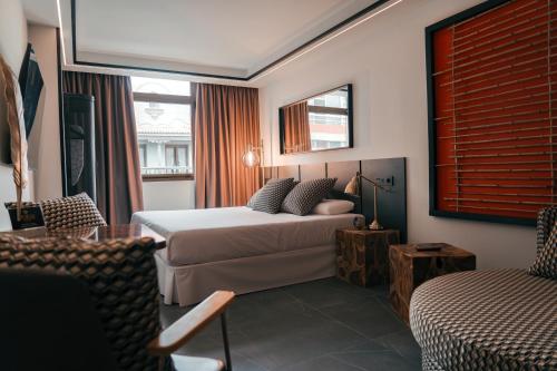 Suite Junior del hotel Poem Suites. Foto 1