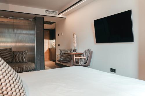 Suite Junior del hotel Poem Suites. Foto 12