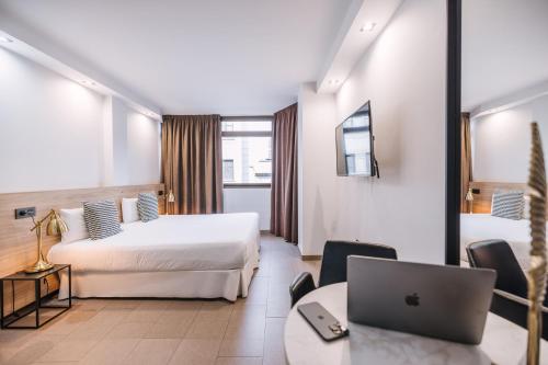 Apartamento con vistas a la ciudad del hotel Poem Suites. Foto 3