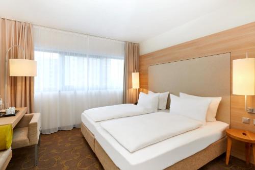 Habitación Doble Confort - 1 o 2 camas del hotel H+ Hotel Salzburg. Foto 1
