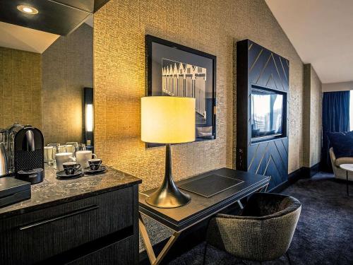 Executive con cama extragrande del hotel Mövenpick Hotel Wellington. Foto 2