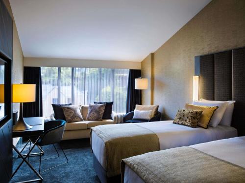 Habitación Doble Deluxe - 2 camas del hotel Mövenpick Hotel Wellington. Foto 3