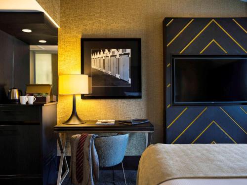 Executive con cama extragrande del hotel Mövenpick Hotel Wellington. Foto 5