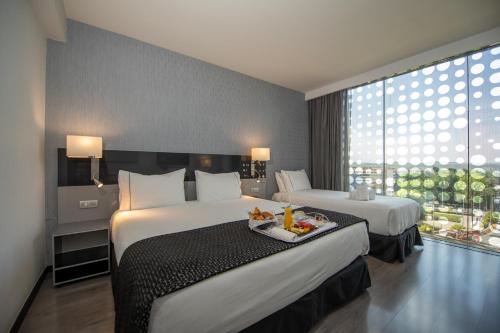 Habitación Deluxe con cama supletoria del hotel Eurostars Palace. Foto 5