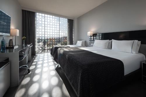 Habitación Deluxe con cama supletoria del hotel Eurostars Palace. Foto 8