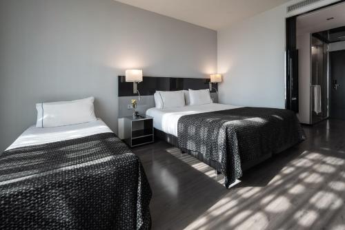 Habitación Deluxe con cama supletoria del hotel Eurostars Palace. Foto 12