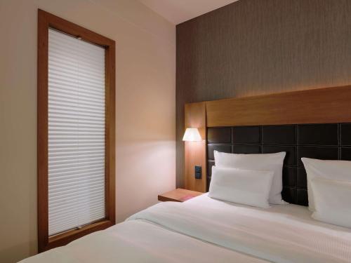 Habitación Doble Premium - 2 camas del hotel Mövenpick Stuttgart Airport. Foto 3