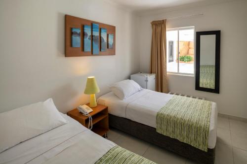 Habitación Doble con vistas al jardín del hotel El Dorado. Foto 5