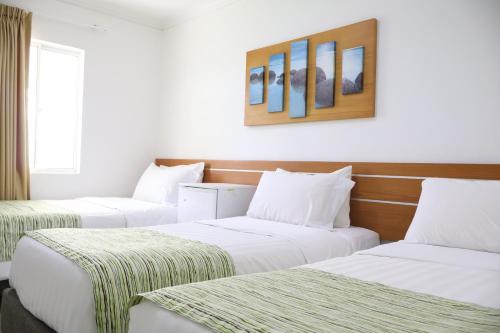 Habitación Triple Estándar con vistas al jardín del hotel El Dorado