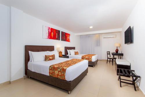 Habitación cuádruple del hotel Playa Club