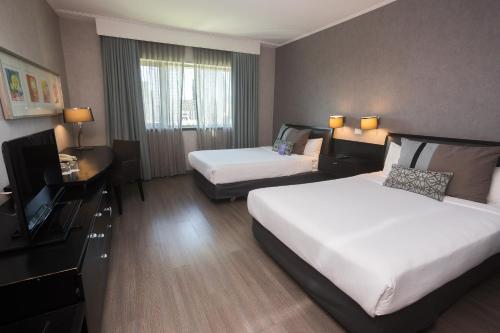 Habitación Doble Clásica - 2 camas del hotel Mercure Santiago Centro. Foto 4