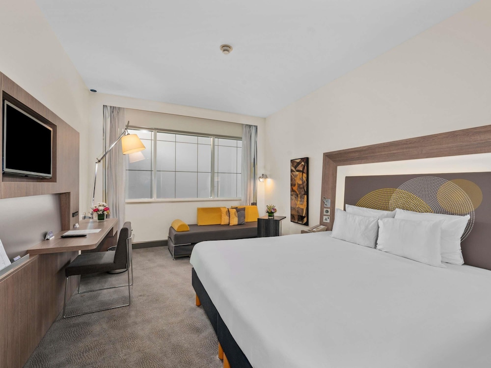 Habitación Familiar Superior con una Cama Doble y Sofá Cama del hotel Novotel World Trade Centre