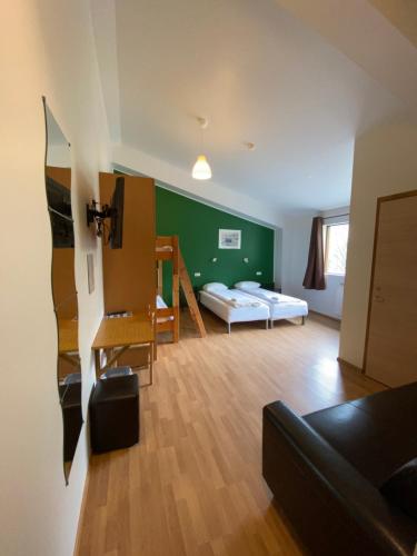 Habitación Cuádruple con baño privado del hotel Hörgsland Guesthouse