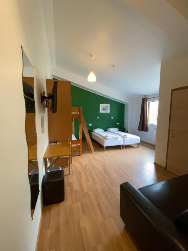 Habitación Cuádruple con baño privado del hotel Hörgsland Guesthouse. Foto 2