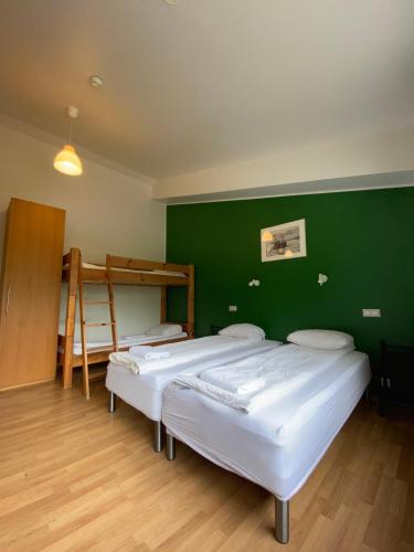 Habitación Cuádruple con baño privado del hotel Hörgsland Guesthouse. Foto 4