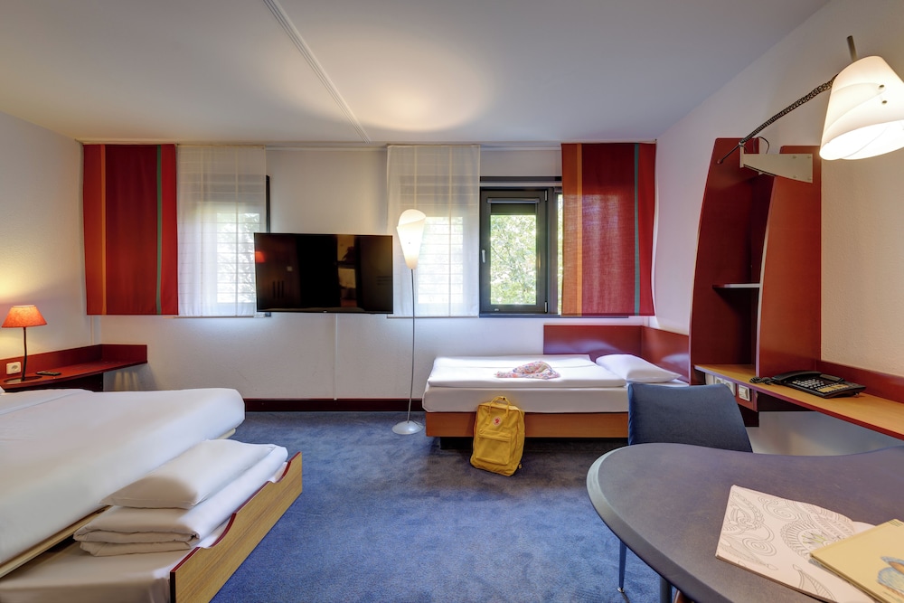 Suite Familiar del hotel Novotel Suites München Parkstadt Schwabing. Foto 1