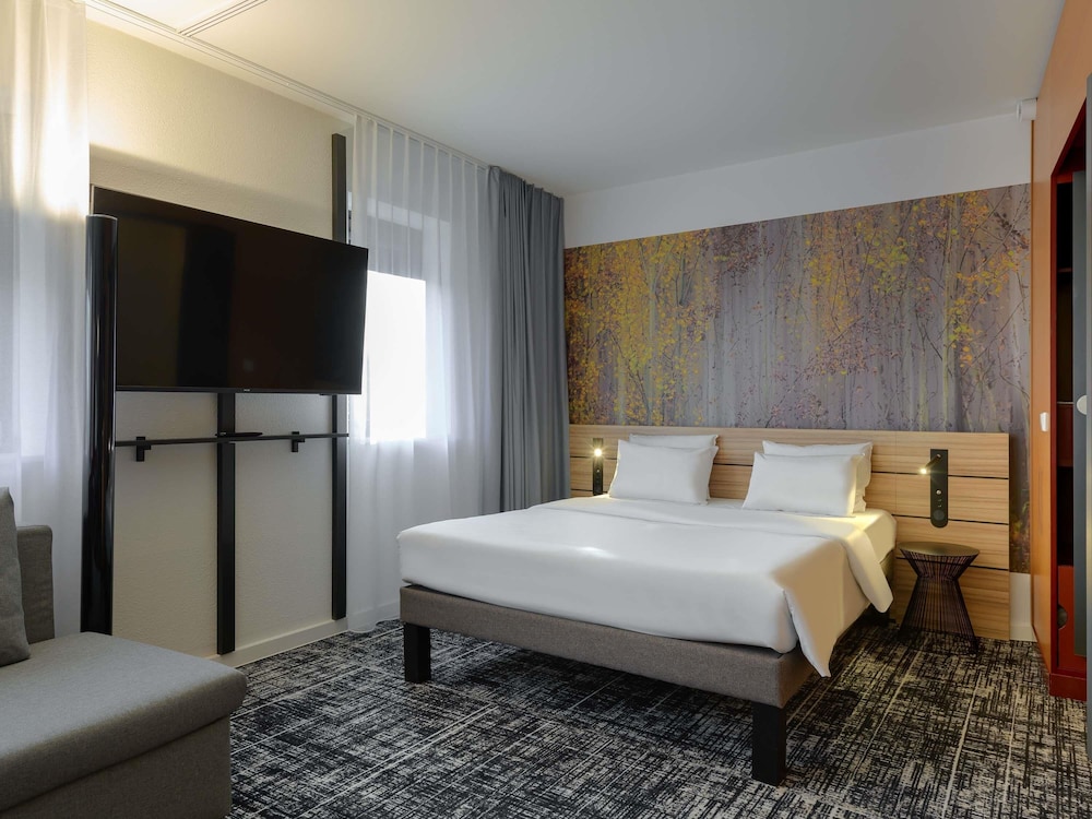 Suite de categoría superior del hotel Novotel Suites München Parkstadt Schwabing. Foto 7