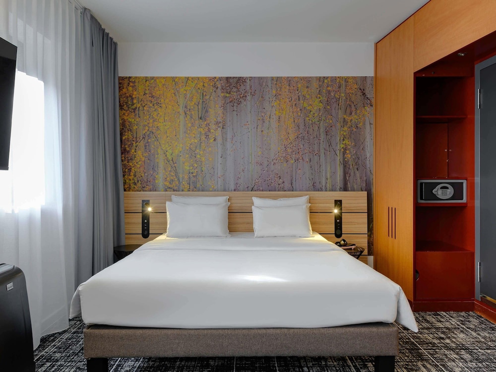 Suite de categoría superior del hotel Novotel Suites München Parkstadt Schwabing. Foto 9