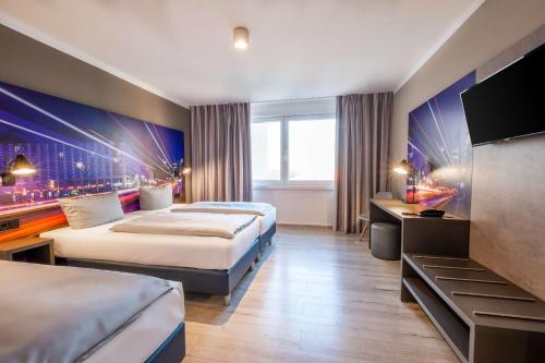 Habitación Familiar del hotel Berlin Lichtenberg. Foto 1
