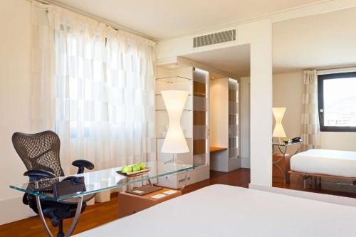 Habitación Deluxe con cama extragrande del hotel Hilton Garden Inn Florence Novoli