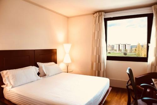 Habitación Doble con vistas al parque - 1 cama doble grande del hotel Hilton Garden Inn Florence Novoli