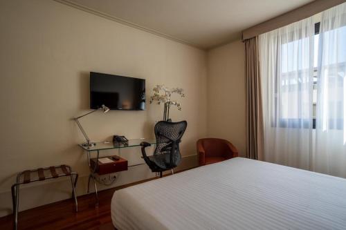 Habitación Doble con vistas al parque - 1 cama doble grande del hotel Hilton Garden Inn Florence Novoli. Foto 2