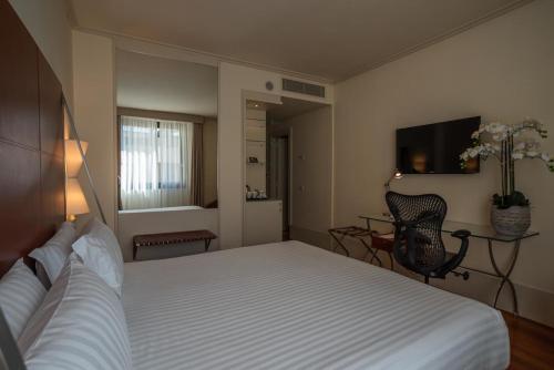 Habitación Doble con vistas al parque - 1 cama doble grande del hotel Hilton Garden Inn Florence Novoli. Foto 3