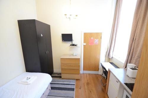Habitación Individual Económica del hotel Amber Residence. Foto 4