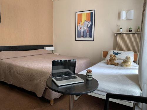 Habitación Triple del hotel Hôtel Alison
