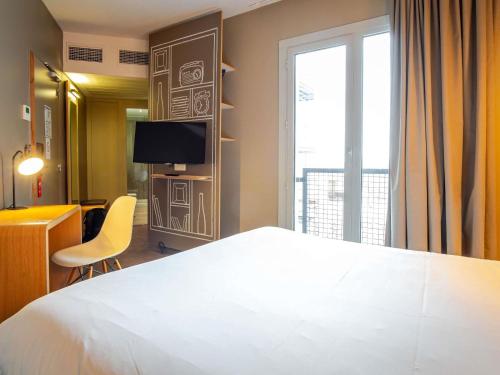 Habitación Doble Estándar del hotel Ibis Bordeaux Centre Gare Saint Jean Euratlantique. Foto 1
